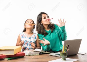 Tutoring Services in India: How to Find the Right Tutor for Better Learning 2 127894372 indian girl studying with mother or teacher at study table with laptop computer books and having